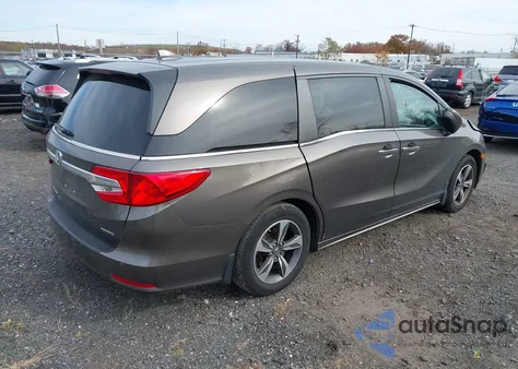 2018 Honda Odyssey Touring z USA, uszkodzony, nr VIN 5FNRL6H8XJB066893